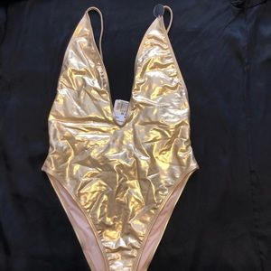 One piece low cut metallic gold swim suit